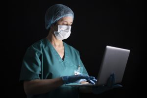 Doctor using technology in a modern healthcare environment